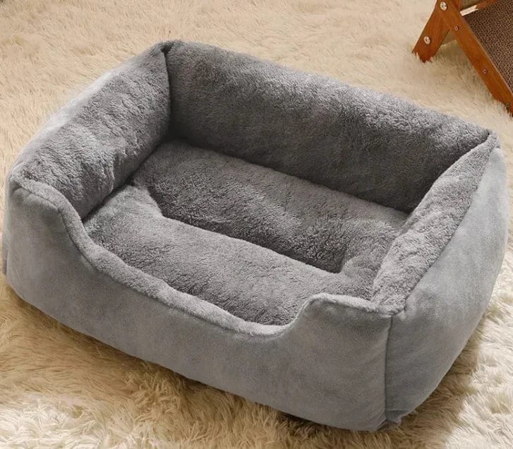 Cushioned round pet bed in Grey