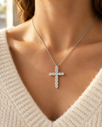 Silver chain necklace worn with a knit sweater