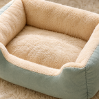 Close-up of the plush pet bed fabric and raised rim