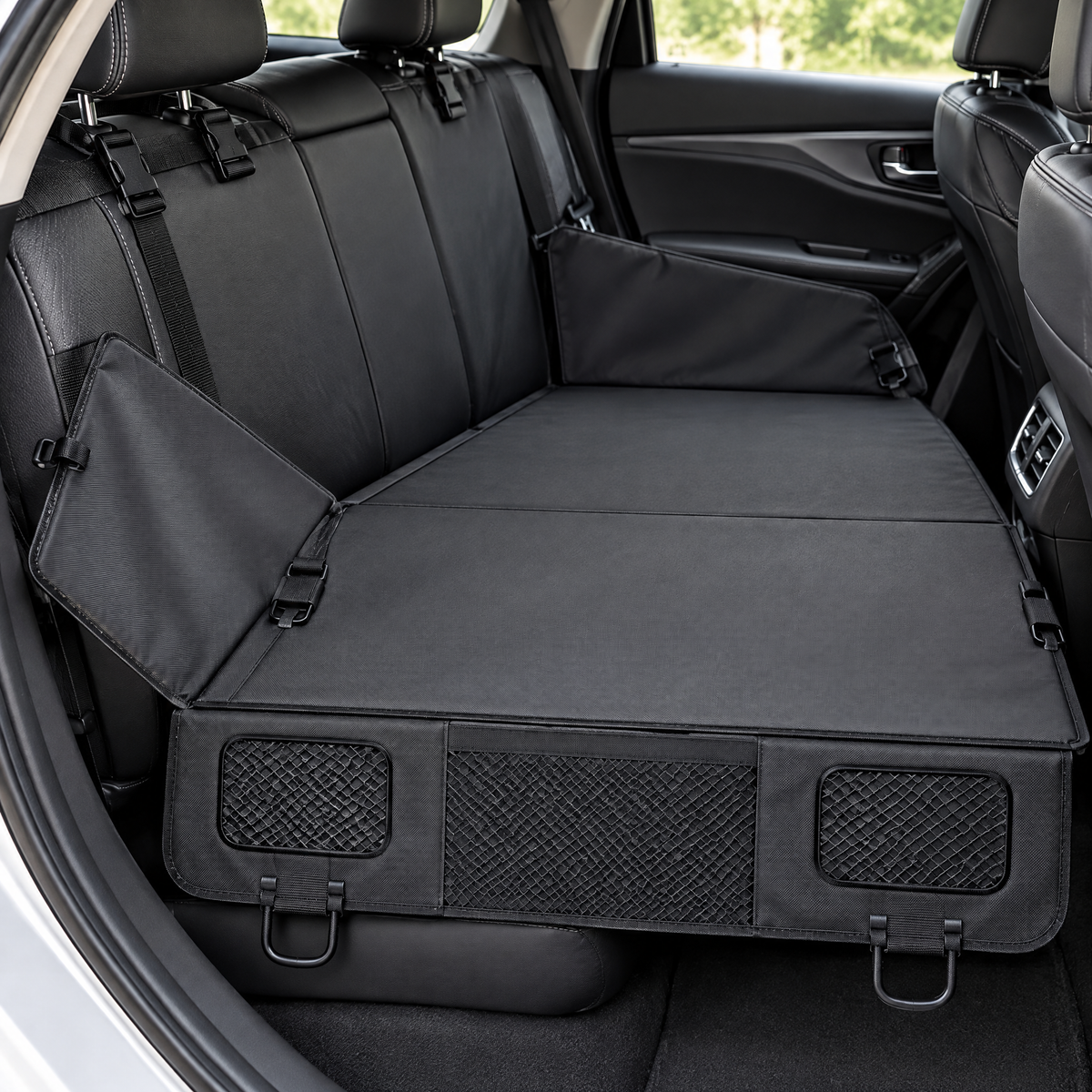 Close-up of the back seat extender fabric and buckles