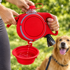 Close-up of hands holding the 4-in-1 dog leash showing the built-in water bottle, bowl and bag dispenser