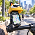 Phone holder with sunshade on a scooter handlebar