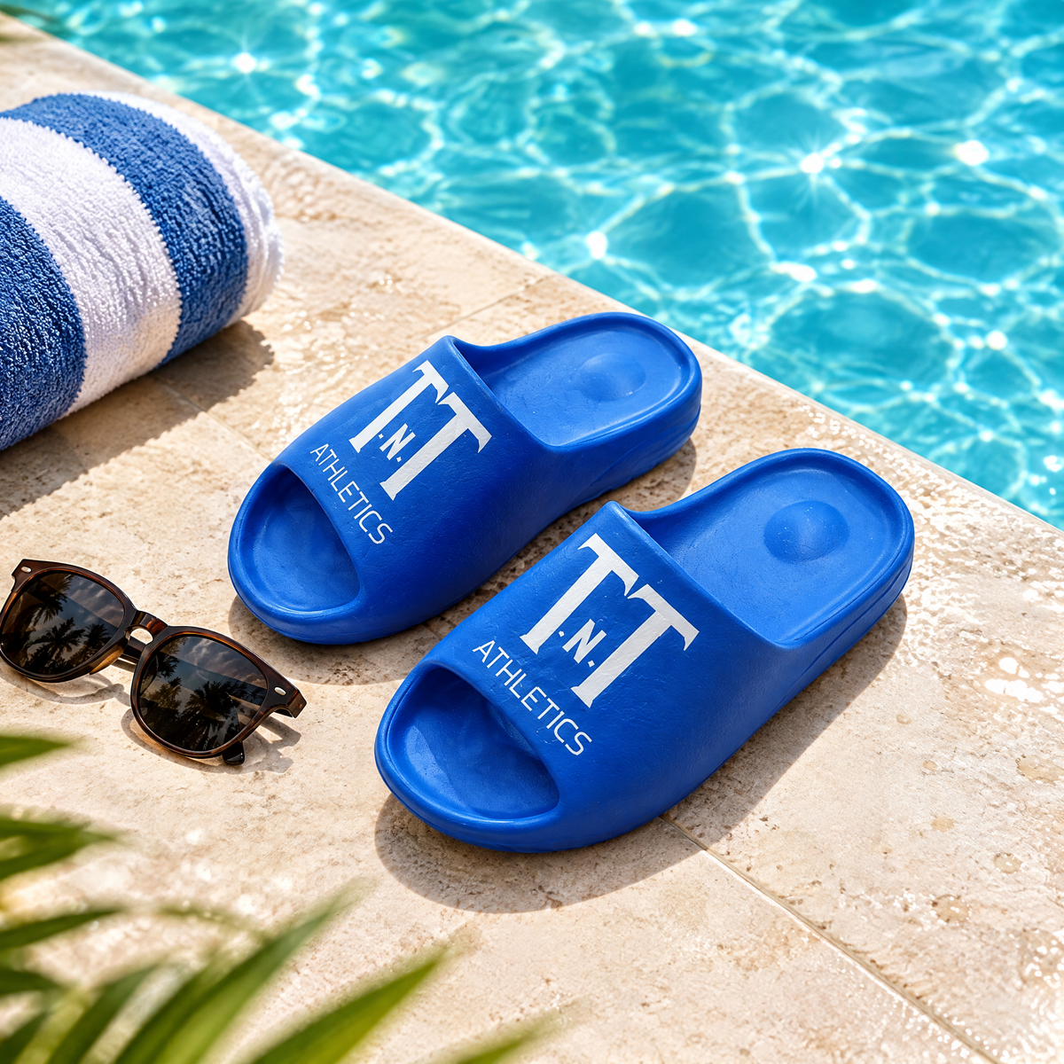 Cloud slide sandals by the pool
