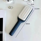Self-cleaning hairbrush in Gray